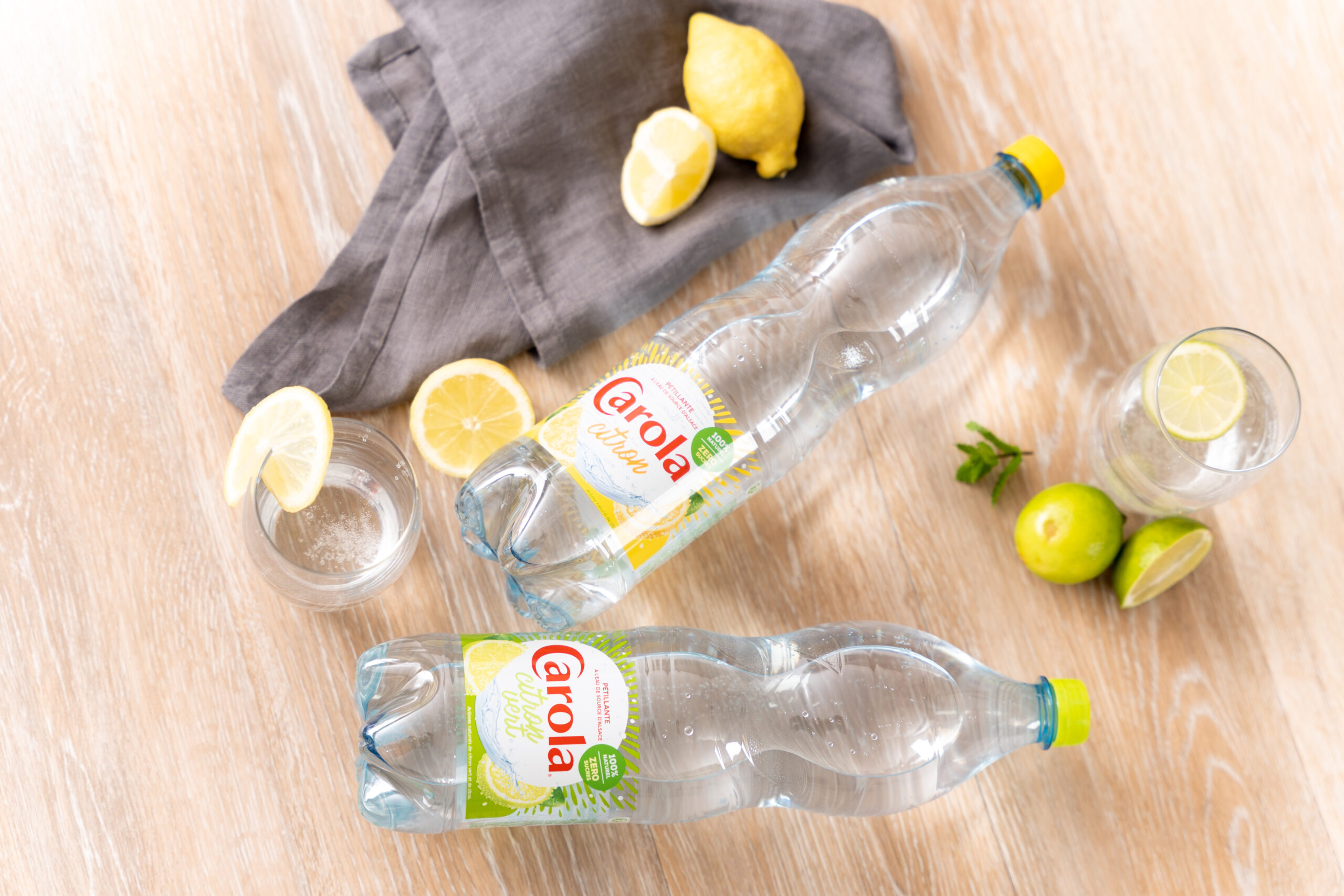 Eau de source aromatisée aux saveurs de fruits – CAROLA